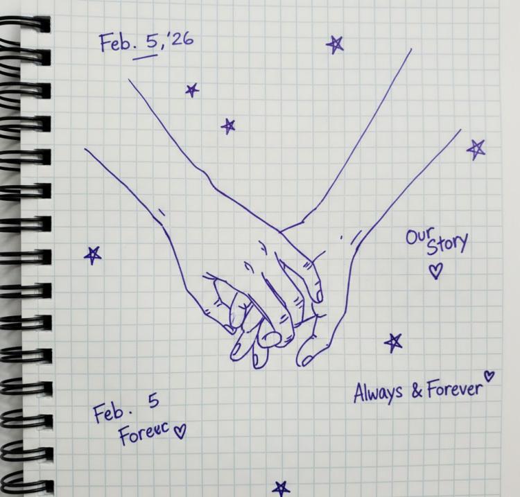 a couple’s intertwined hands