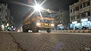 Truck lightly bumps crate reversing